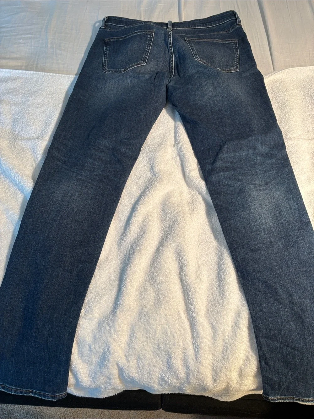 Uniqlo Men's Skinny Ripped Dark Blue Jeans - tapered style